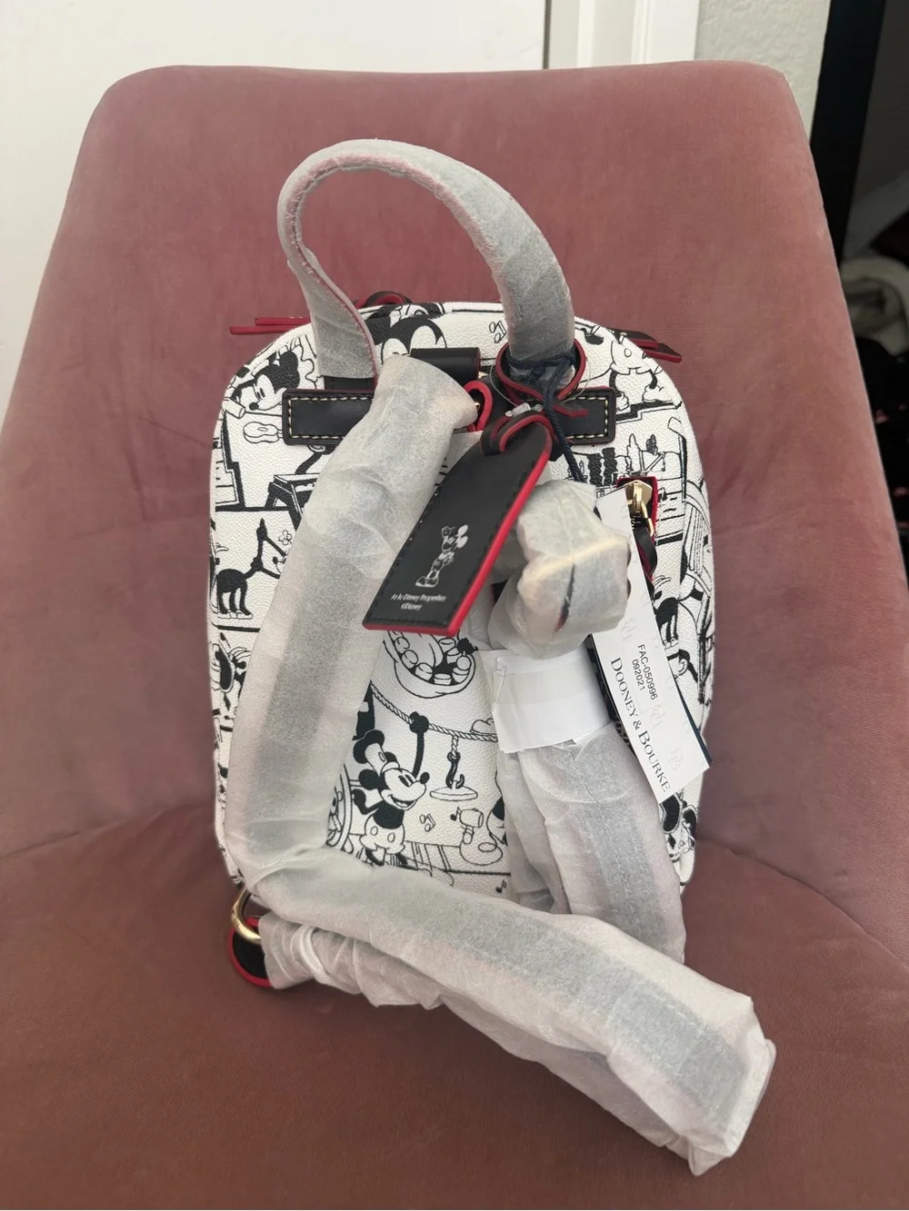 Disney Dooney and Bourke Black & White Cartoon Print Mini Backpack with Red Trim